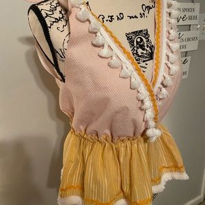 Yellow, white, and orange tasseled blouse